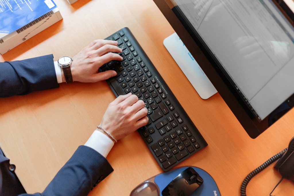 man on a computer