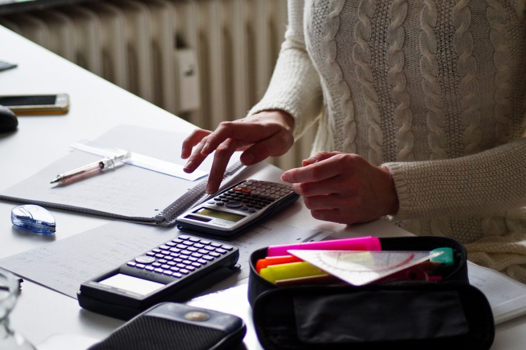 woman using a calculator