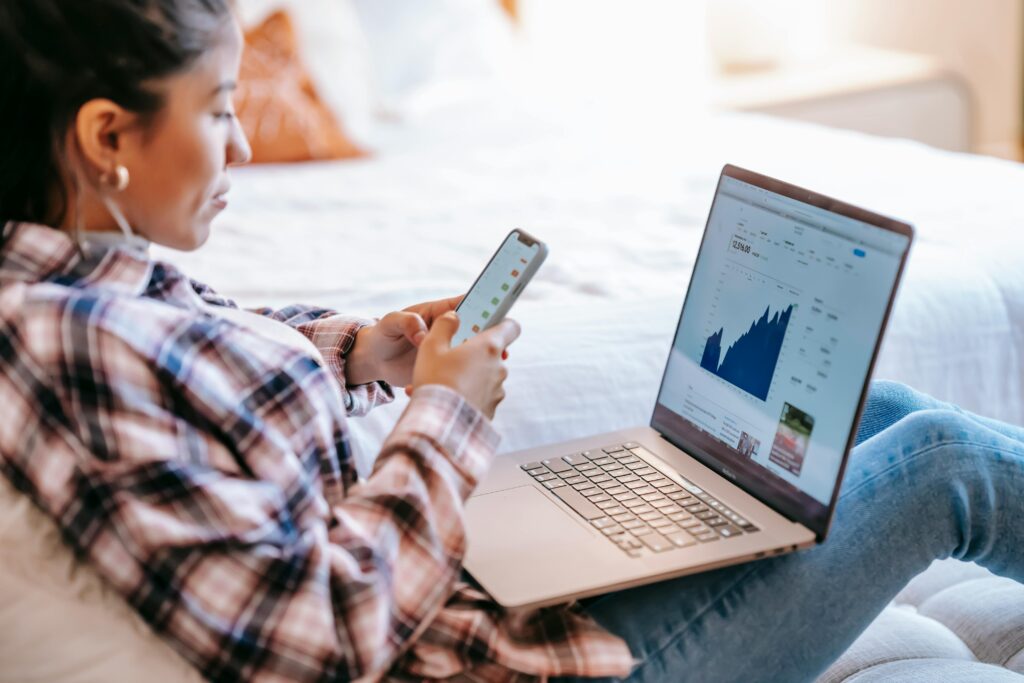 Image of a woman looking over investment information.